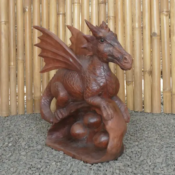 Product image 4 of the product “Dragon with leg lifted on the right made from suar wood, about 50cm Height ”